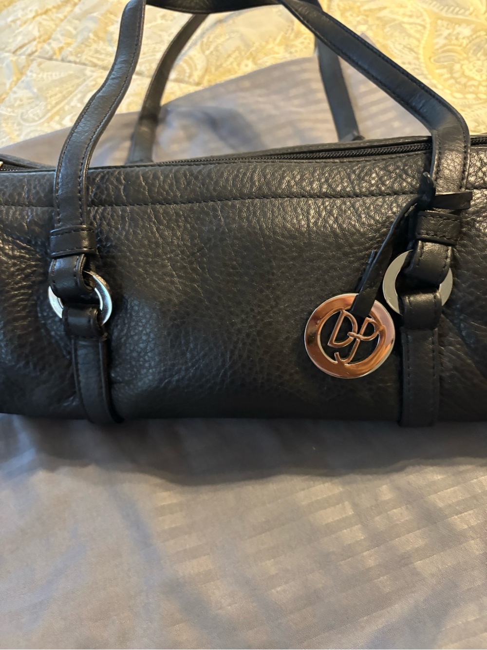 Black Leather Barrel Shoulder Bag with Silver Logo Charm Donald Pliner